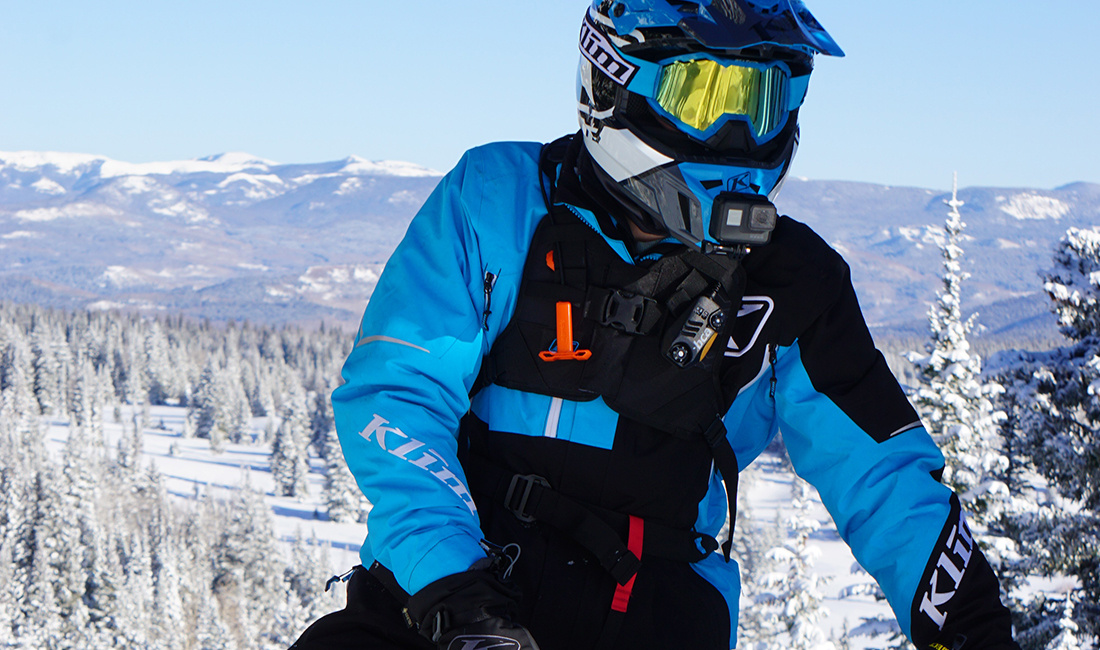 Justin Ponsor riding a Snowmobile