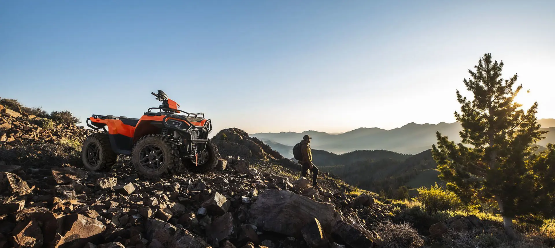 Polaris sportsman 570 ultimate trail limited edition atv parked on a rocky hillside