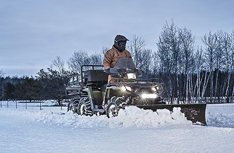 Polaris sportsman 6x6 570 pushing snow with a plow