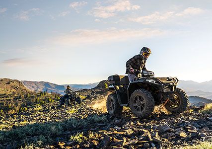  polaris sportsman 850 riders traversing comfortably with independent rear suspension