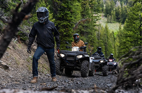 sportsman touring xp 1000 trail with a winch and front rack storage options
