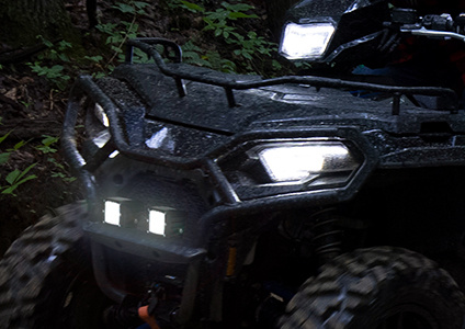 Close up of a Polaris xp 1000 with Pro Armor lighting option equipped