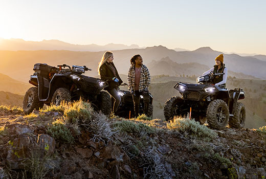 RZR 570 going down a green trail road