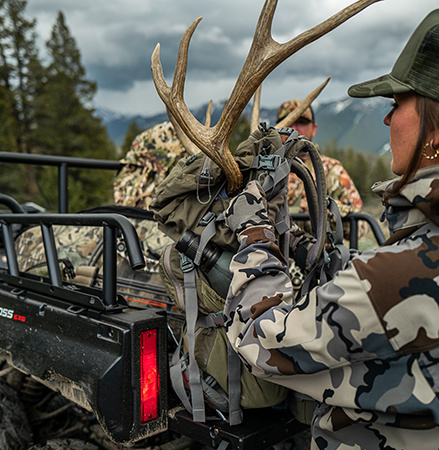 2 people spending more time doing what they love thanks to the extended service intervals of the 2025 Polaris Sportsman 6x6 570 2-up ATV.