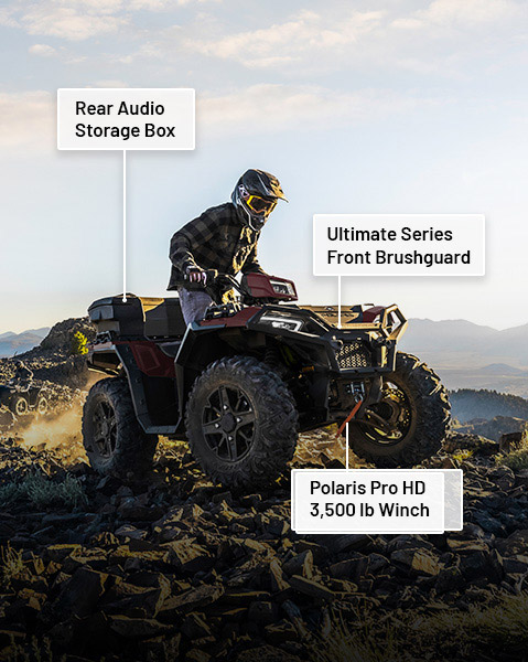 Rear Audio Storage Box, 7-inch RIDE COMMAND display, Ultimate Series Front Brushguard, and Polaris Pro HD 3500 lb Winch accessories from the Trail Riding Package installed on a 2025 Polaris Sportsman 850 ATV.