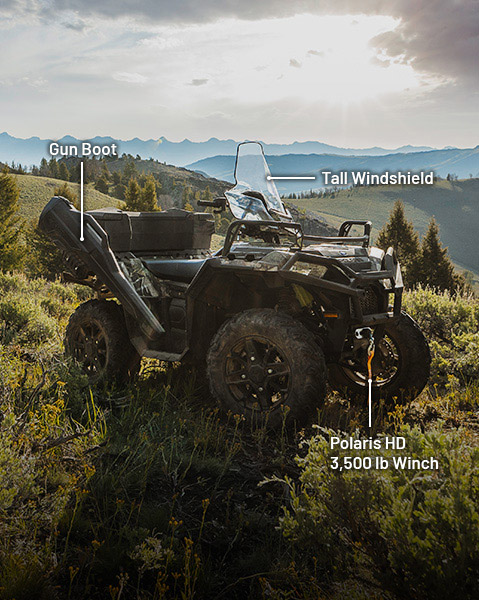 Gun boot, Tall Windshield, Ultimate Series Front Brushguard, and Polaris Pro HD 3500 lb Winch accessories from the Hunt Package installed on a 2025 Polaris Sportsman 850 ATV.

