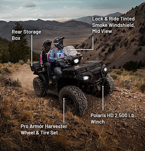 Rear storage box, Lock & Ride Mid-View Tinted Smoke Windshield, Pro Armor Harvester Wheel & Tire Set and Polaris HD 2500 Lb. Winch on a 2025 Polaris Sportsman Touring 850 ATV.