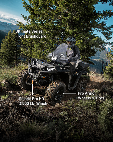 Ultimate Series Front Brushguard, Polaris Pro HD 3500 lb. Winch, Rear Audio Storage Box and Pro Armor Wheels & Tire accessories from the Trail Riding Package installed on a 2025 Polaris Sportsman XP 1000 ATV.