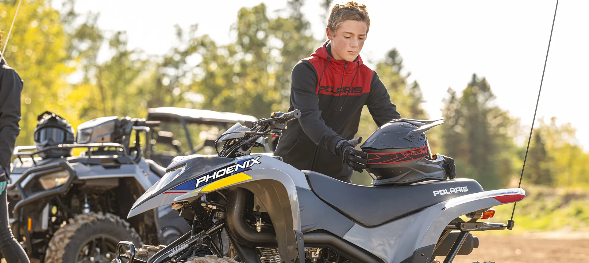 4 Polaris youth ATVs in a lineup including the 2026 Polaris Phoenix 200 youth ATV.