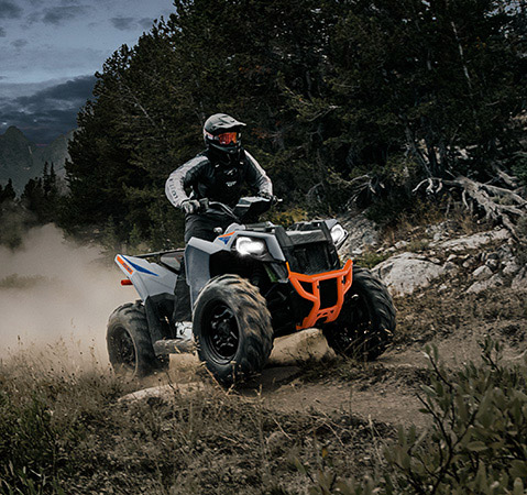 Rider on a 2026 Polaris Scrambler 850 sport ATV showcasing it's nimble 48-inch width.