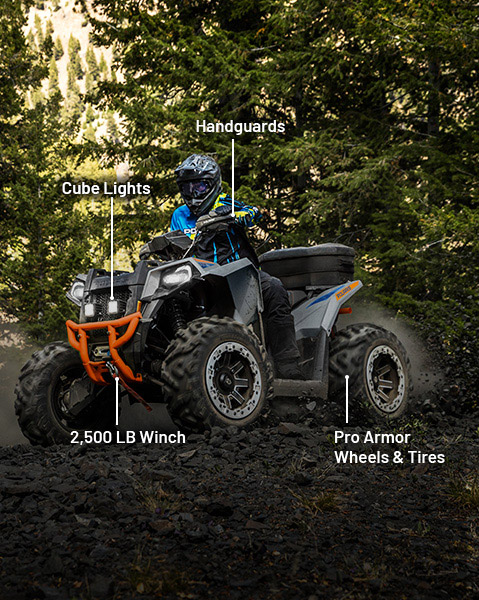 Cube lights, handguards, Polaris HD 2,500 lb. winch, and Pro Armor Wheel & Tire accessories installed on a 2026 Polaris Scrambler 850 sport ATV. 