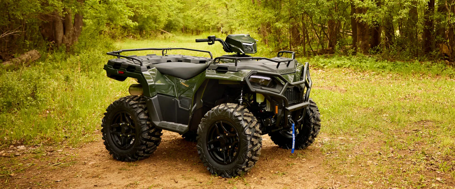 Side profile of a 2026 Polaris Sportsman 570 Premium 40th Anniversary Edition ATV.