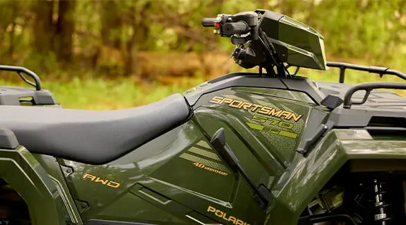 Closeup of the side and seat of a 2026 Polaris Sportsman 570 Premium 40th Anniversary Edition ATV.
