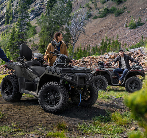 2 riders showcasing the nimble 48-inch width of the 2026 Sportsman Touring XP 1000 Trail ATV.
