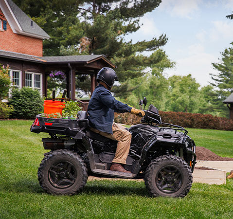 Driving using Turf Mode on the 2026 Polaris Sportsman X2 570 ATV.
