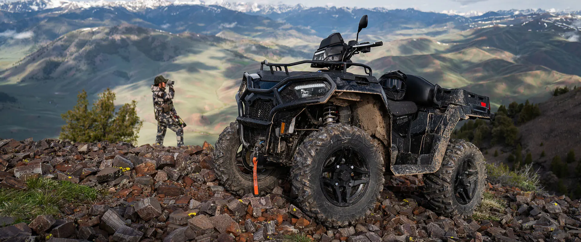 A hunter scoping a location with a 2026 Polaris Sportsman X2 570 ATV.