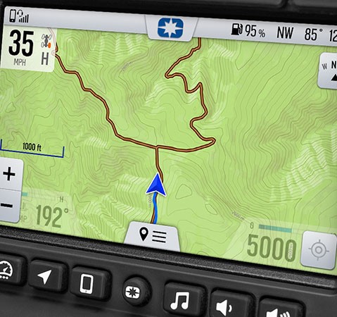 A RIDE COMMAND GPS touch screen on a Polaris Sportsman ATV.