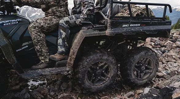 Closeup of the tires on a 2027 Polaris Sportsman 6x6 600 2-up ATV.