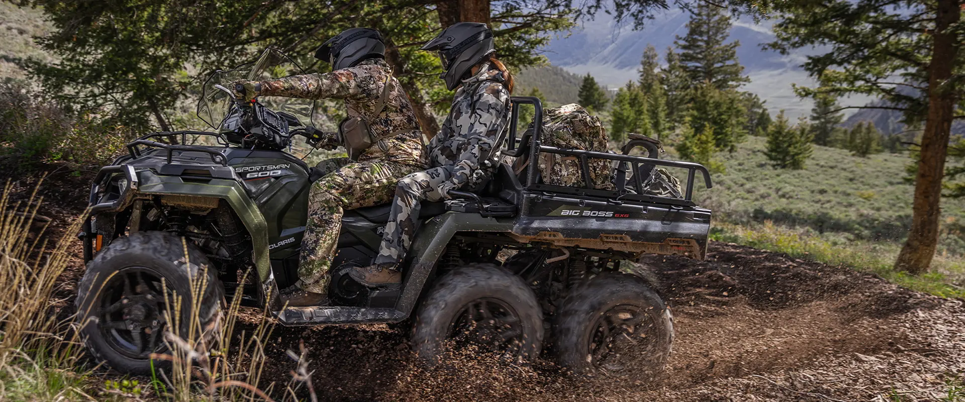 2 hunters on a 2027 Polaris Sportsman 6x6 600 2-up ATV.