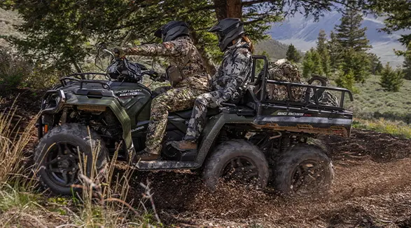 2 hunters on a 2027 Polaris Sportsman 6x6 600 2-up ATV.