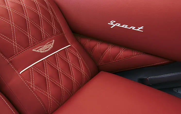 closeup of the stitching and accents on the seating of a bennington qx sport pontoon boat
