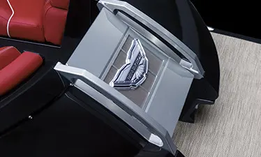 closeup of the bennington branding on the bow gate on a bennington qx sport pontoon boat