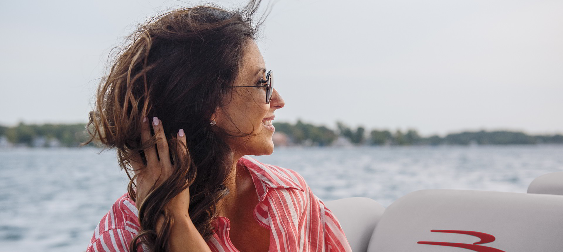 A woman enjoying a ride in a Bennington R