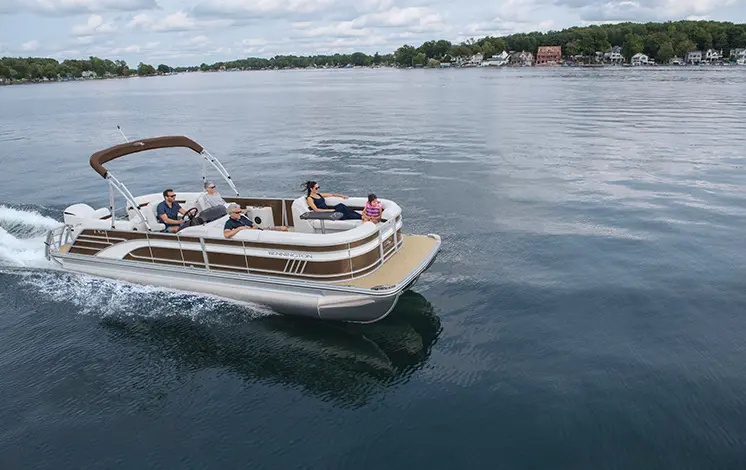 Bennington LX pontoon cruising across a lake
