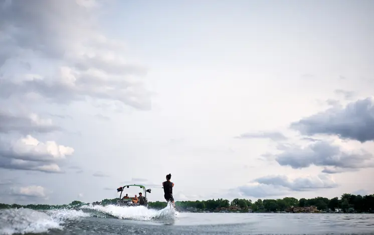 wake boarding behind a Bennington LX pontoon