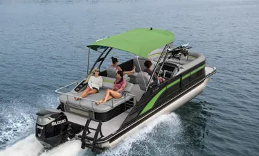 bennington lx pontoon boat cruising on a lake