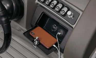 phone storage and charging options on a Bennington LX pontoon