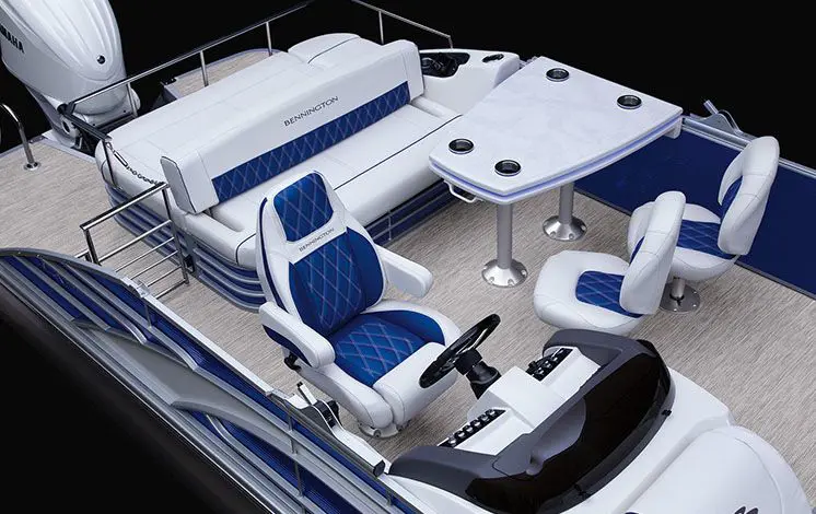 aerial view of the captain's chair and table seating on a bennington lx pontoon boat