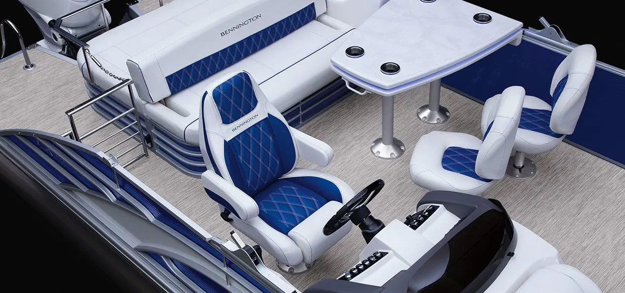 aerial view of the captain's chair and table seating on a bennington lx pontoon boat