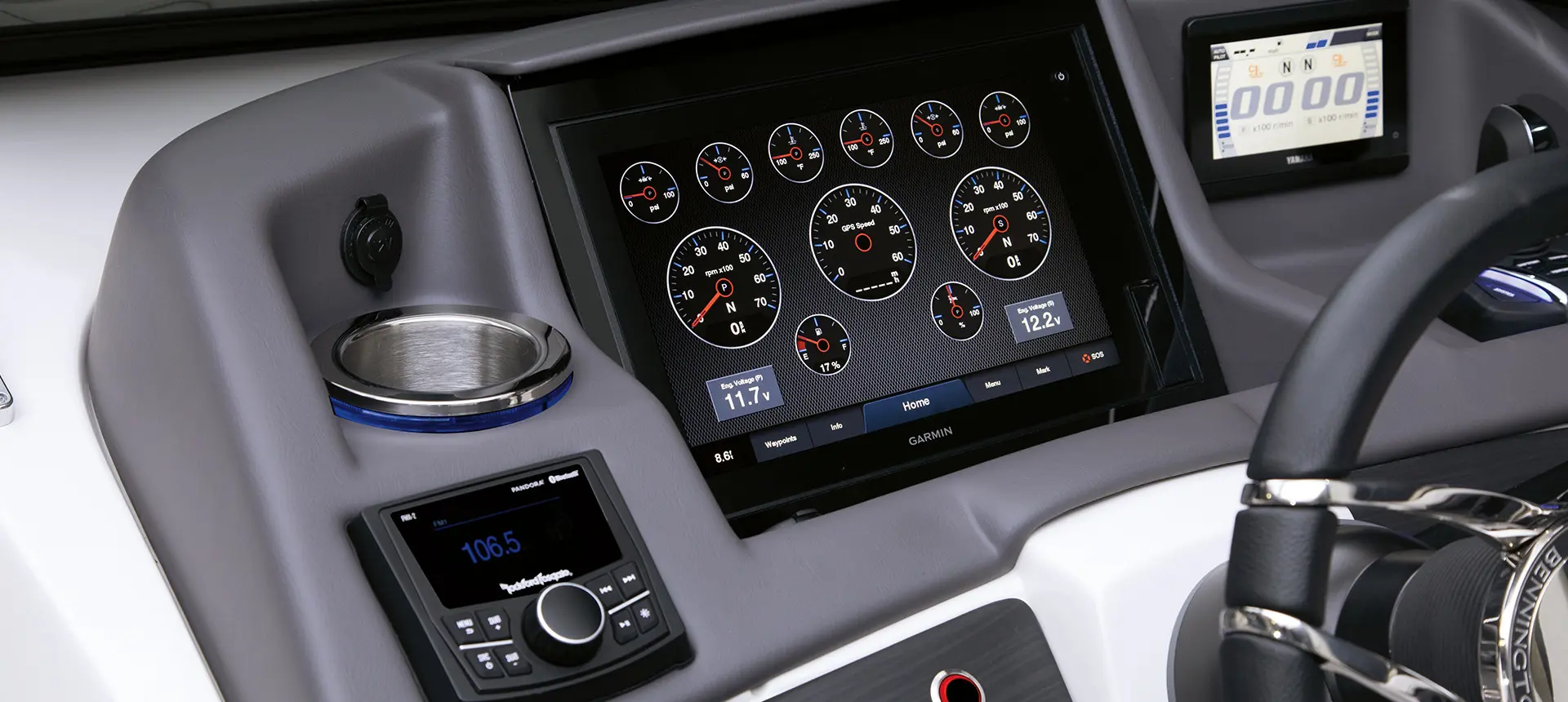 audio interface and screens on the helm of a bennington q pontoon boat