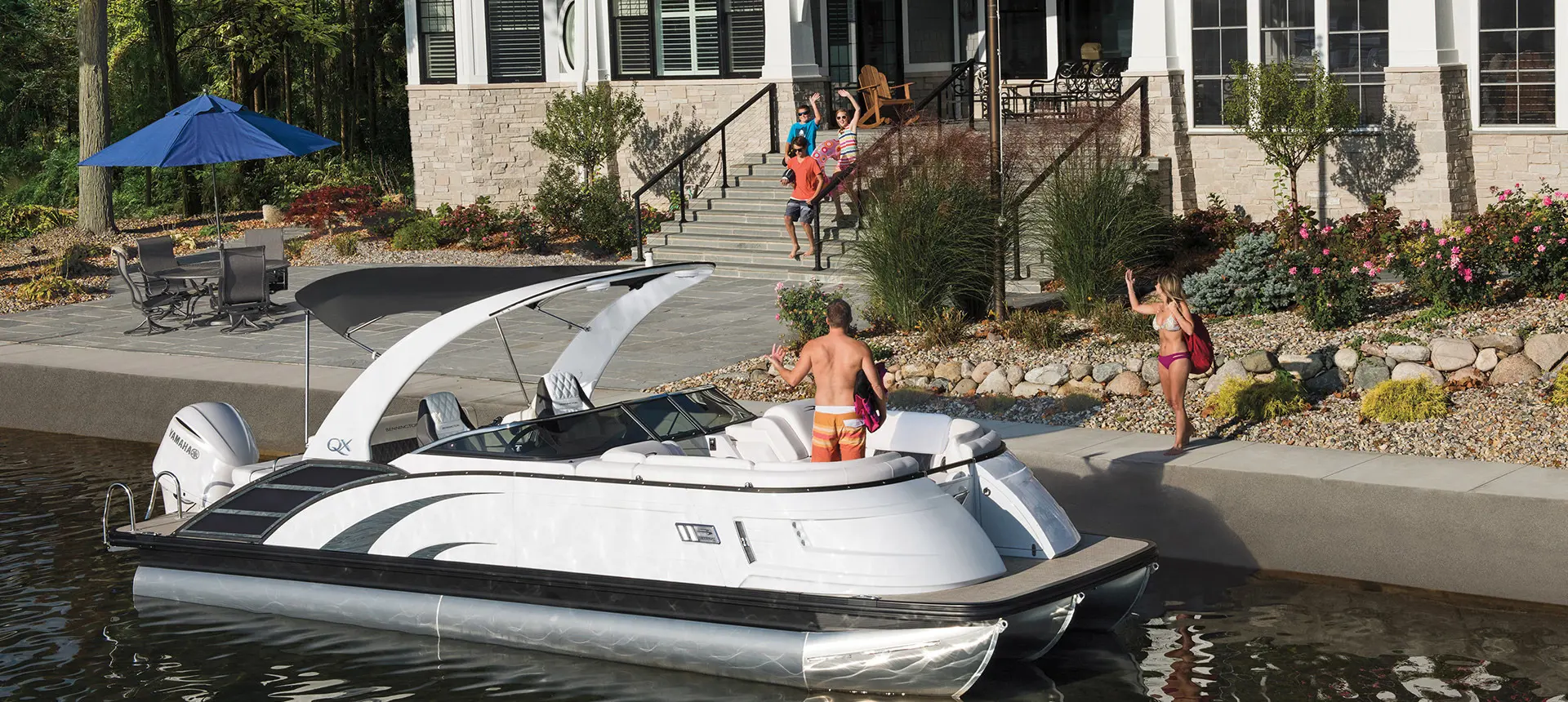 A group of friends getting ready to board their Bennington QX pontoon