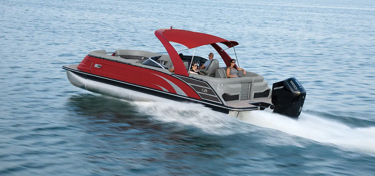 Bennington QX pontoon cruising across a lake