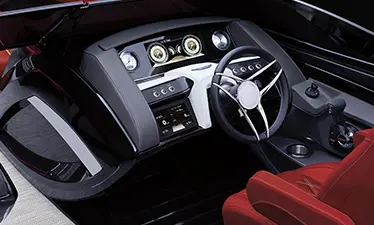 digital gauges on the helm of a bennington qx sport pontoon boat