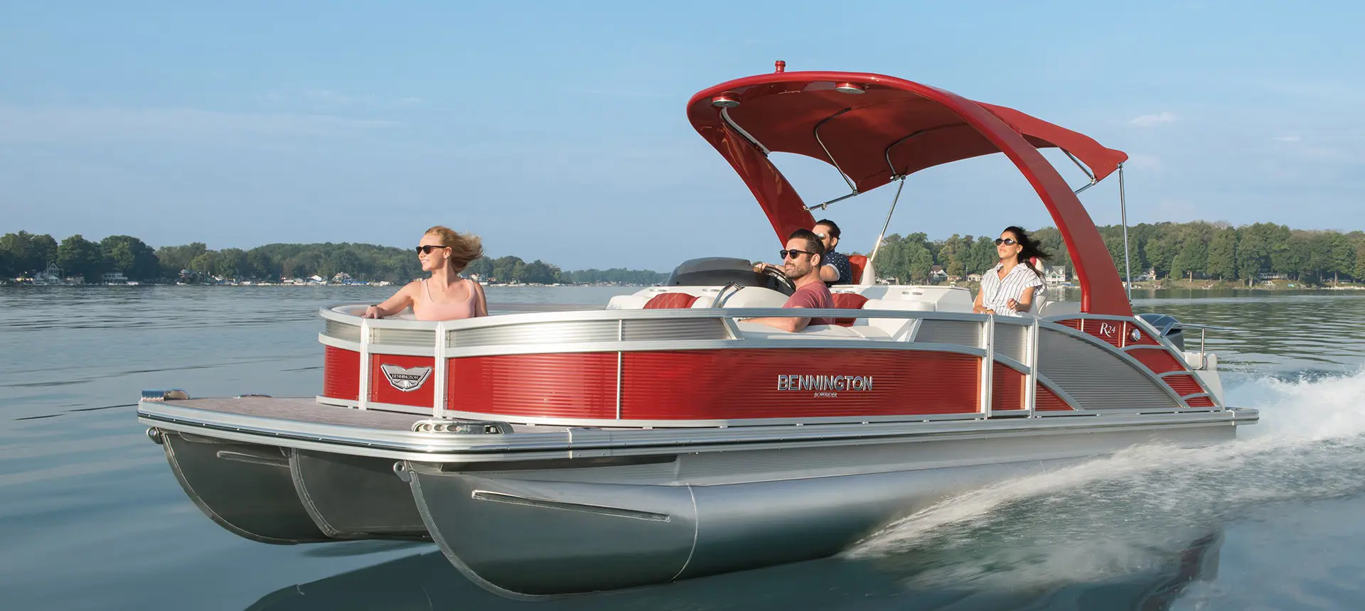 R Bowrider boat cruising through the water