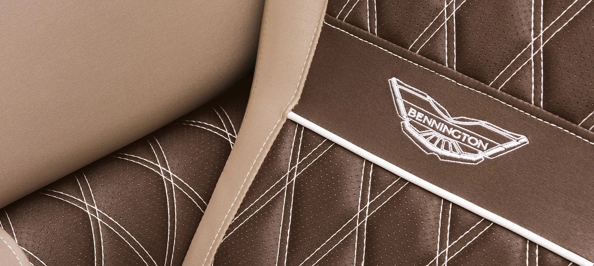 premium leather brown seats close up on a Bennington R Bowrider Pontoon Boat