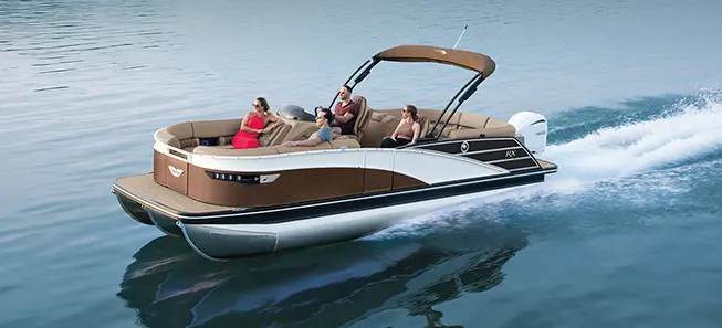 A family riding their Bennington RX Sport in the water