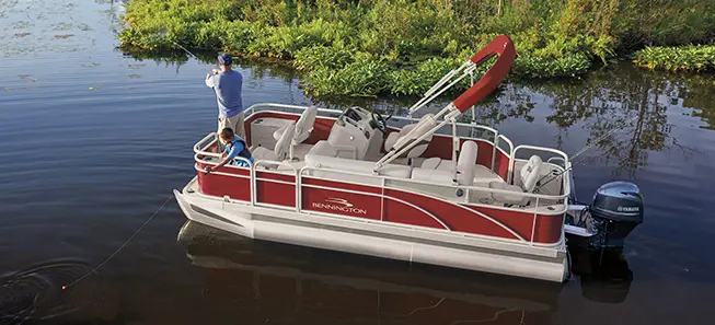 Father and son fishing on a Bennington SV pontoon boat