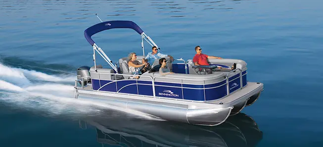 Bennington SV pontoon boat cruising across a lake