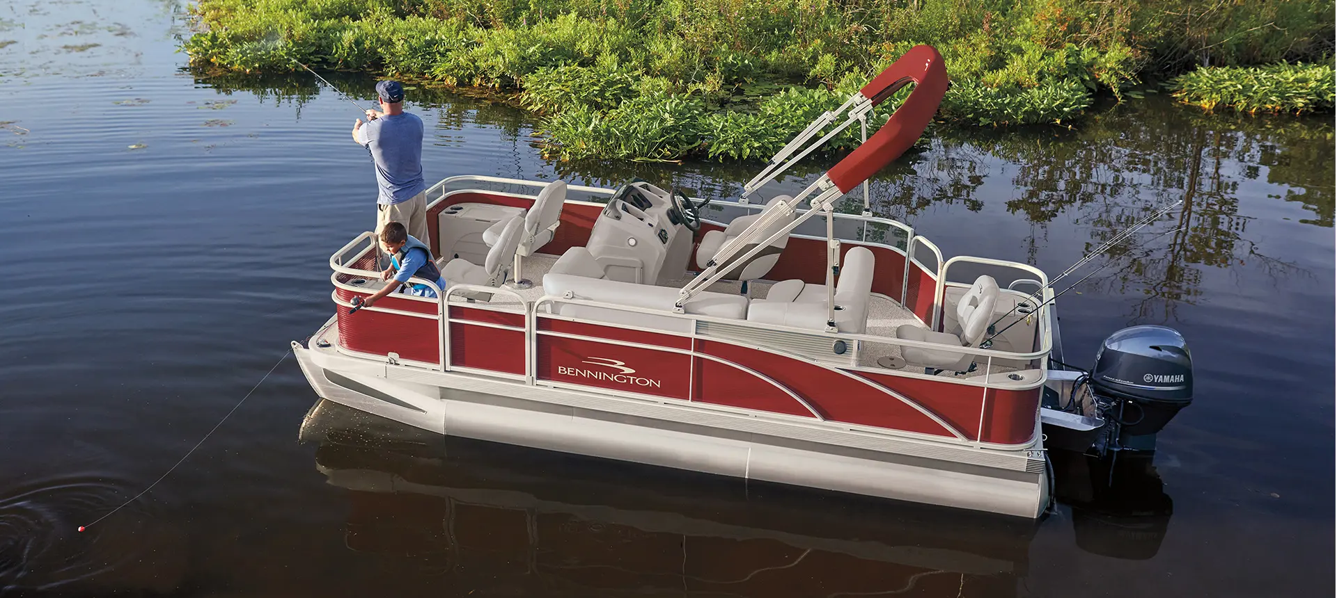 Father and son fishing on a Bennington SV pontoon boat