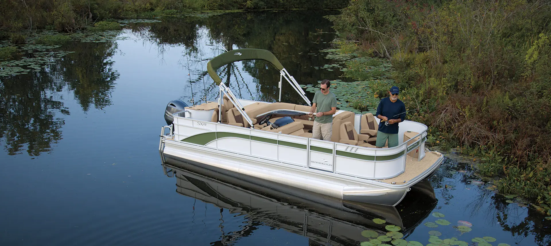 Two men fishing on a Bennington SX pontoon boat