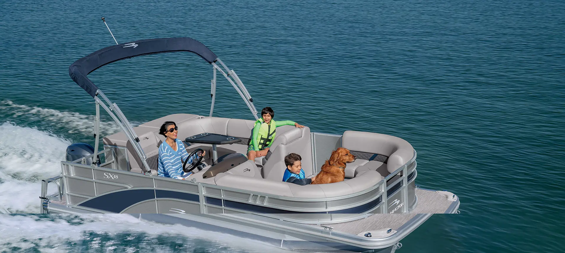 Bennington SX pontoon boat cruising on a lake