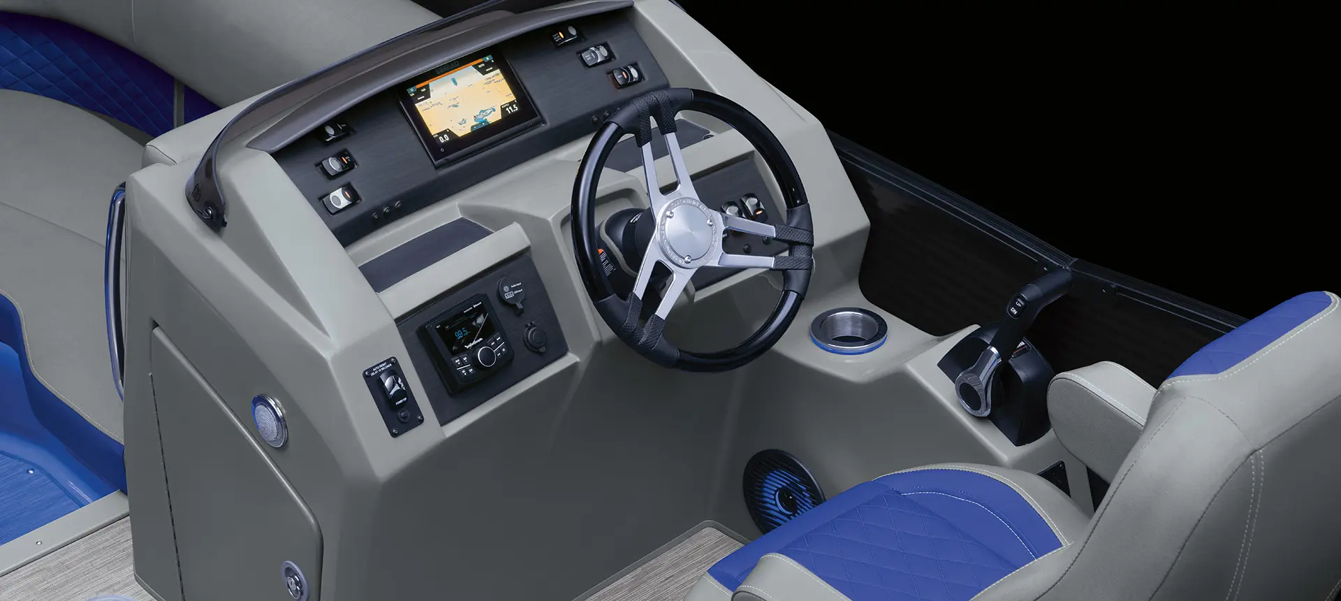 steering wheel and gauges on a bennington l bowrider pontoon boat