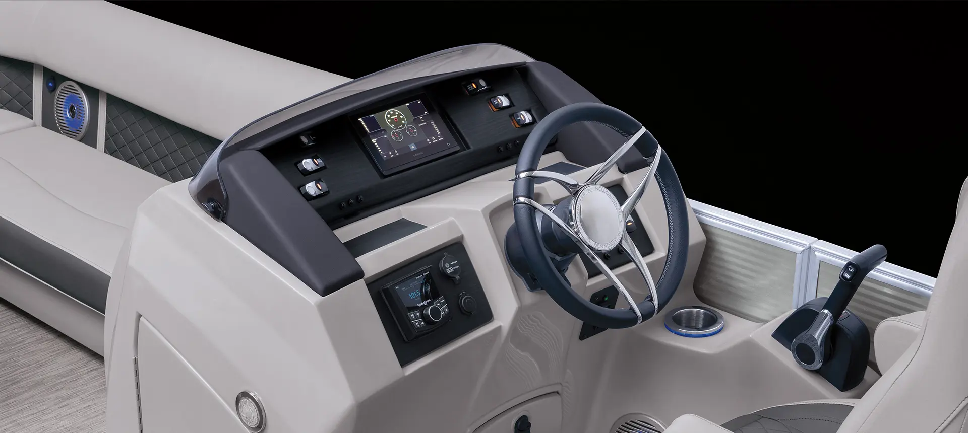 steering wheel and features on the helm of a bennington l pontoon boat