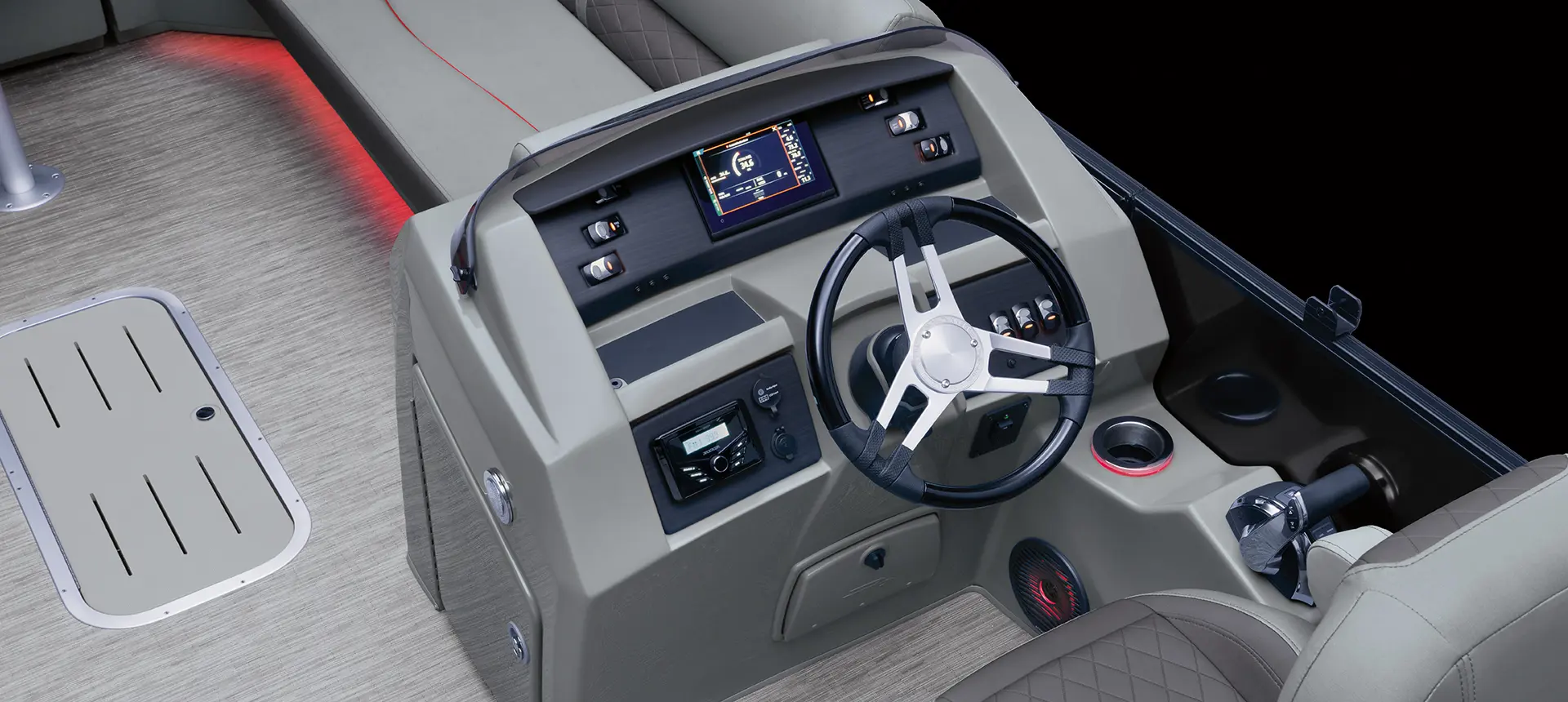 steering wheel on the helm of a bennington l pontoon boat