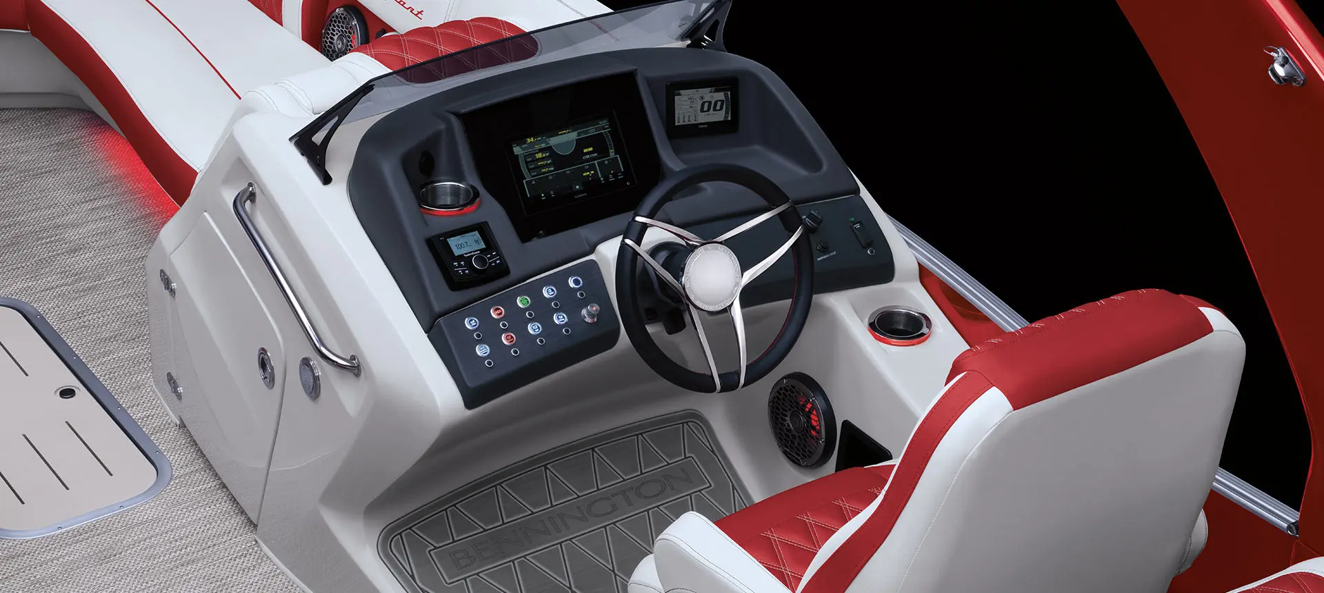 the steering wheel and captain's chair on the helm of a bennington q pontoon boat
