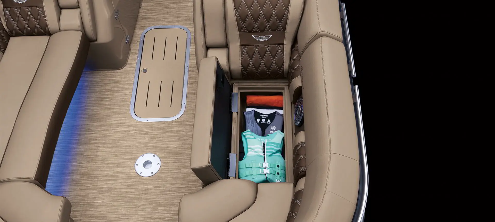 in-seat storage on a Bennington QX pontoon boat